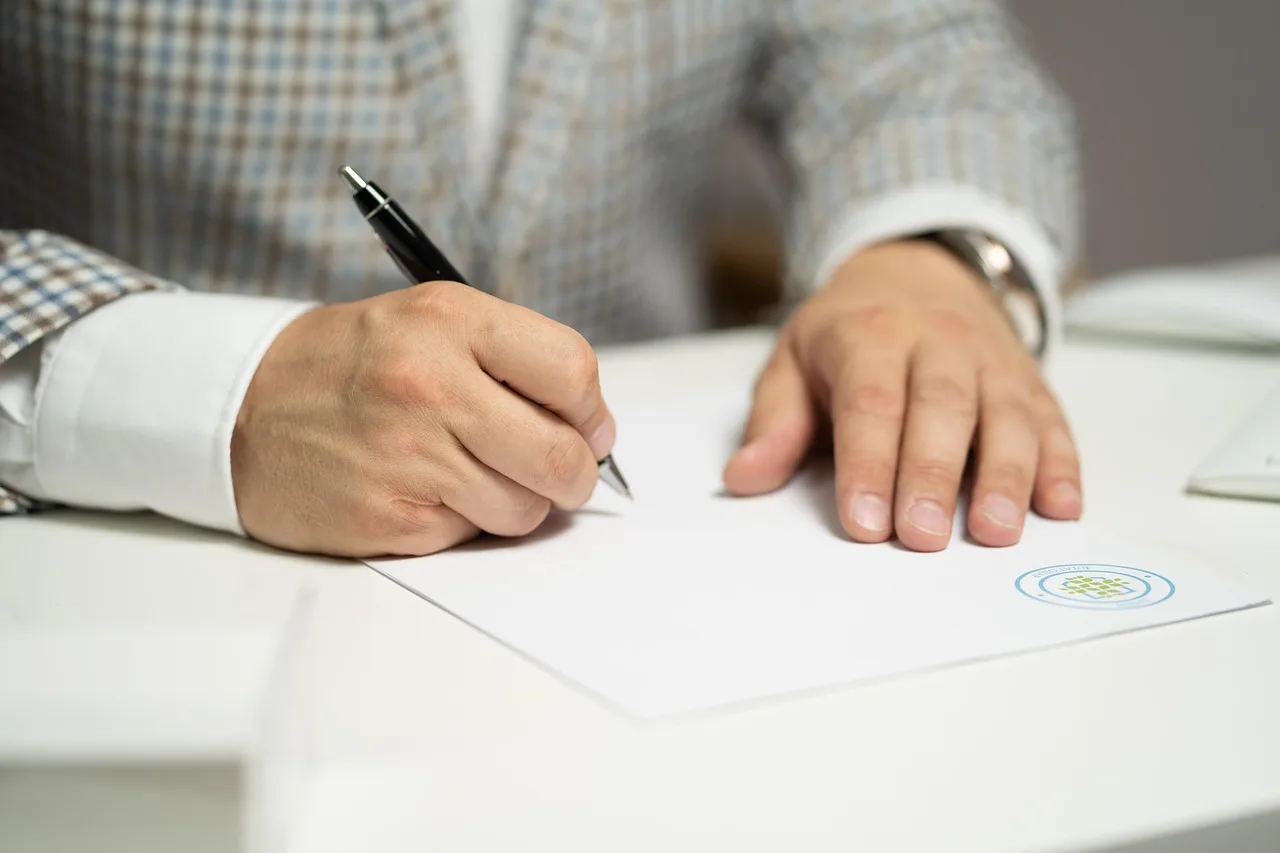 man, sign, paper, write, document, contract, signing, agreement, signature, signing document, signing contract, signing paper, sign, contract, contract, contract, contract, contract, signing, agreement, signature, signature. Creator business checklist: contracts, disclosures, rights, and records