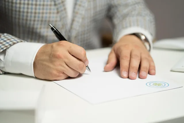 man, sign, paper, write, document, contract, signing, agreement, signature, signing document, signing contract, signing paper, sign, contract, contract, contract, contract, contract, signing, agreement, signature, signature. Creator business checklist: contracts, disclosures, rights, and records