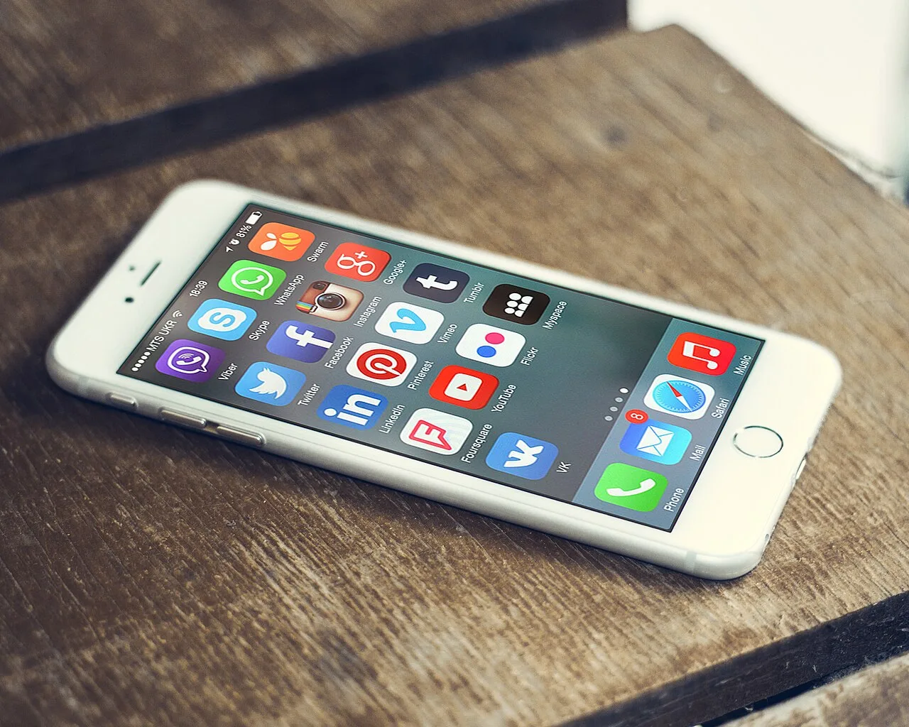 Smartphone displaying a set of social media application icons